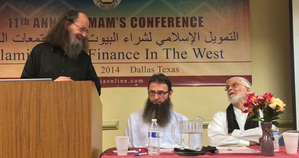 Shaykh Jamaal Zarabozo and Shaykh Yusuf Talal Delorenzo discussing the contract of Guidance Financial. Imam Sphendim Nadzaku moderating.